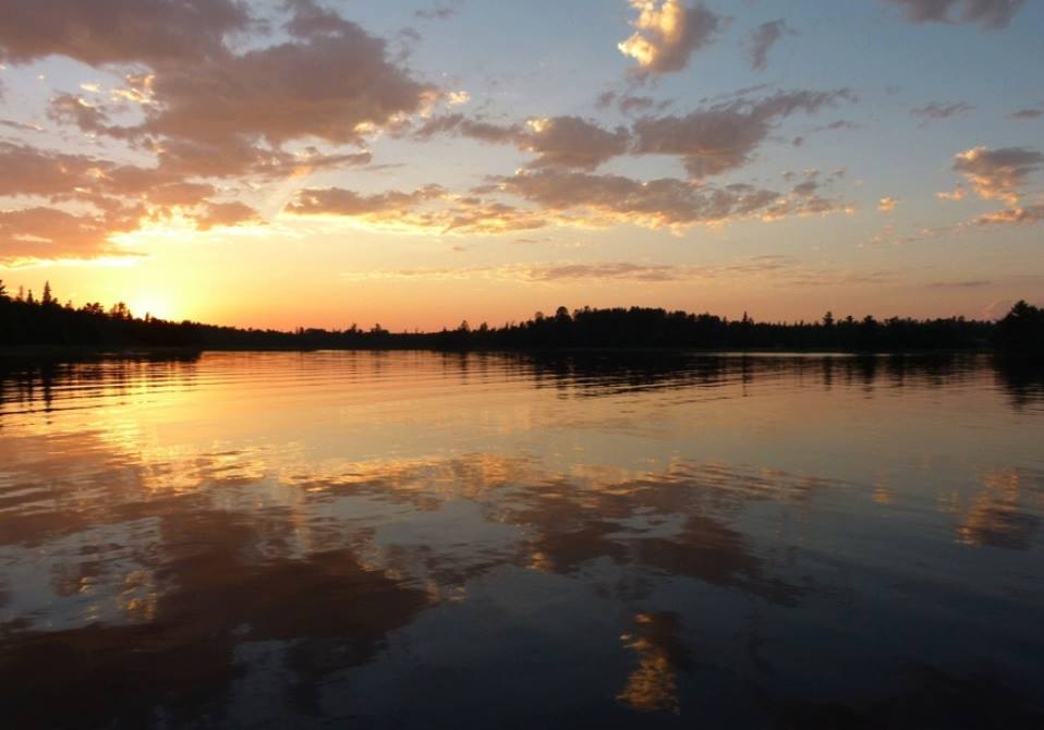 sunset on rainy lake